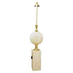 Lampadaire rare en travertin, signé Philippe Barbier, vers 1960.