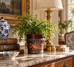 French Neoclassical Burgundy & Gold Tole Cachepot with Brass Lion Heads