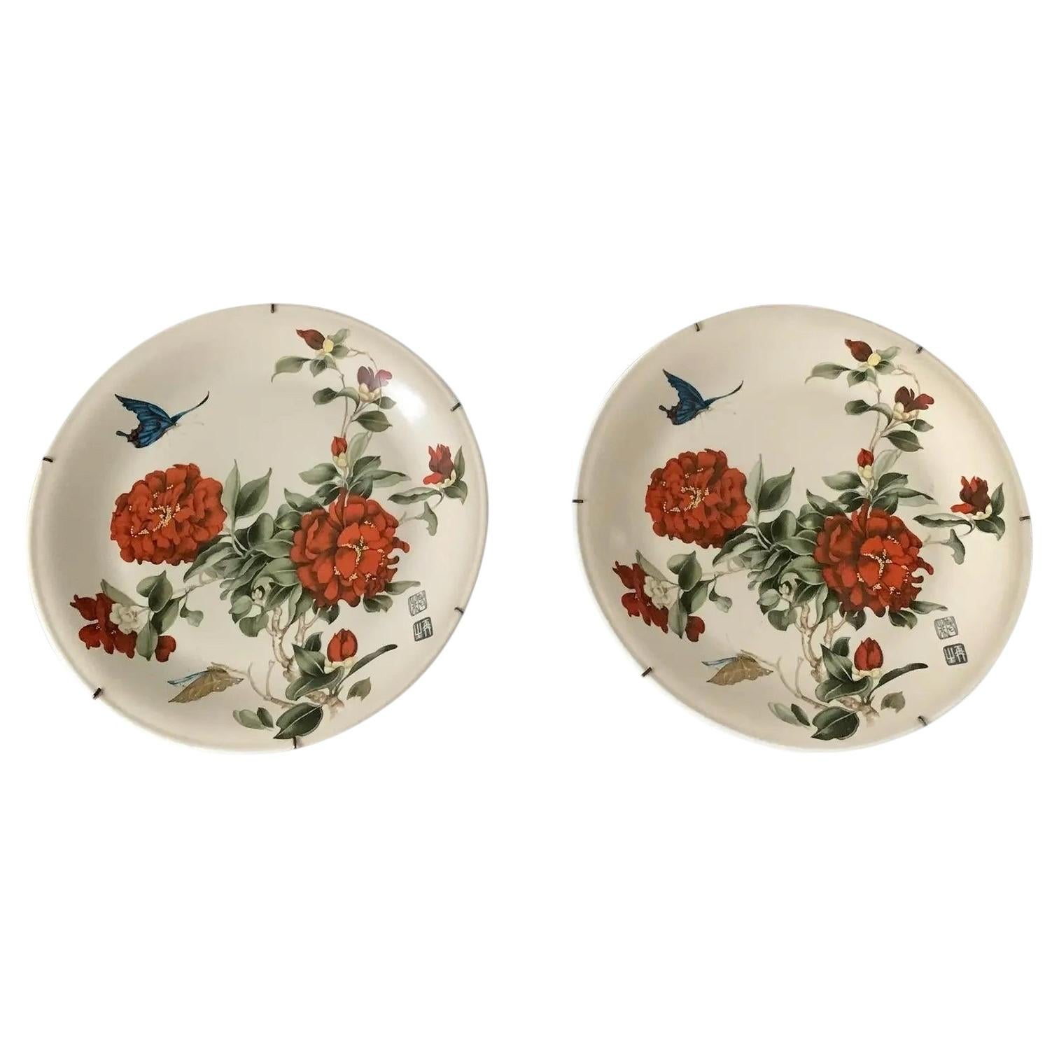 Early 20th Century Chinoiserie Floral Butterfly Wall Plates, Pair For Sale