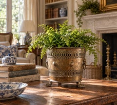 Circa 1940s Neoclassical Pierced Brass Cachepot with Lion Paw Feet