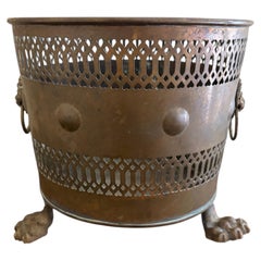 Circa 1940s Neoclassical Pierced Brass Cachepot with Lion Paw Feet