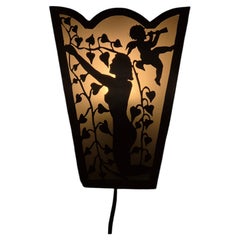 Swedish Grace wall light, decor of woman & cherub. white metal & glass, 1930s.