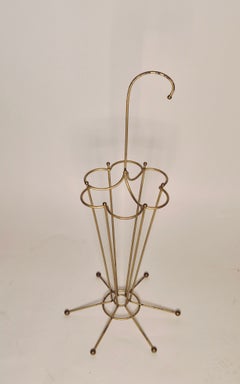 Midcentury Modern umbrella stand, metal with gold color finish, 1950s.