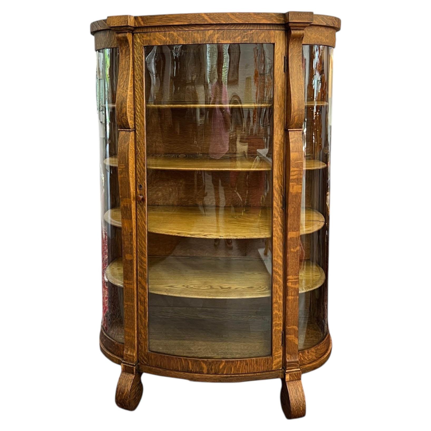 Antique American Tiger Oak Bowfront Curio Cabinet with Bent Glass, c. 1900 For Sale