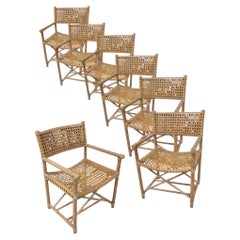Set of Seven McGuire "Antalya" Laced Rawhide & Rattan Dining Armchairs