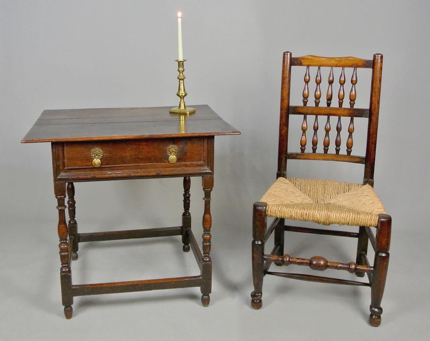 A most attractive and elegant late 17th Century oak lowboy with a lovely natural and well developed patina and rich warm colour.

The single drawer with original oak lining and early, possibly original, brass drop handles with snaped fixings,