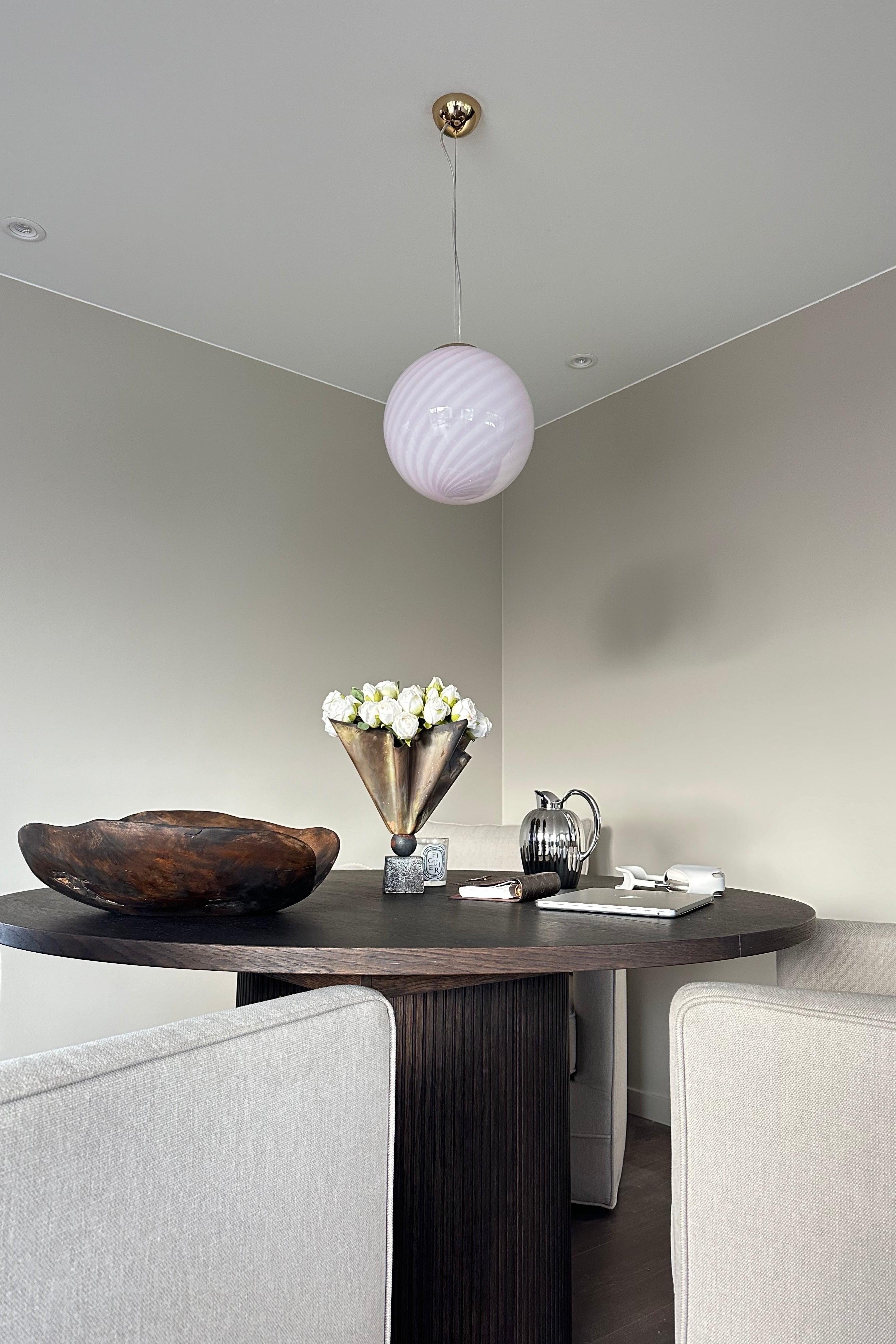 New Italian Murano candy pendant ceiling lamp in soft pink. Mouth-blown glass in round shape with swirl pattern. E27 socket. Comes with adjustable suspension.
Handmade in Italy.
D:30 cm  

As it is mouth blown glass, the expression will differ from