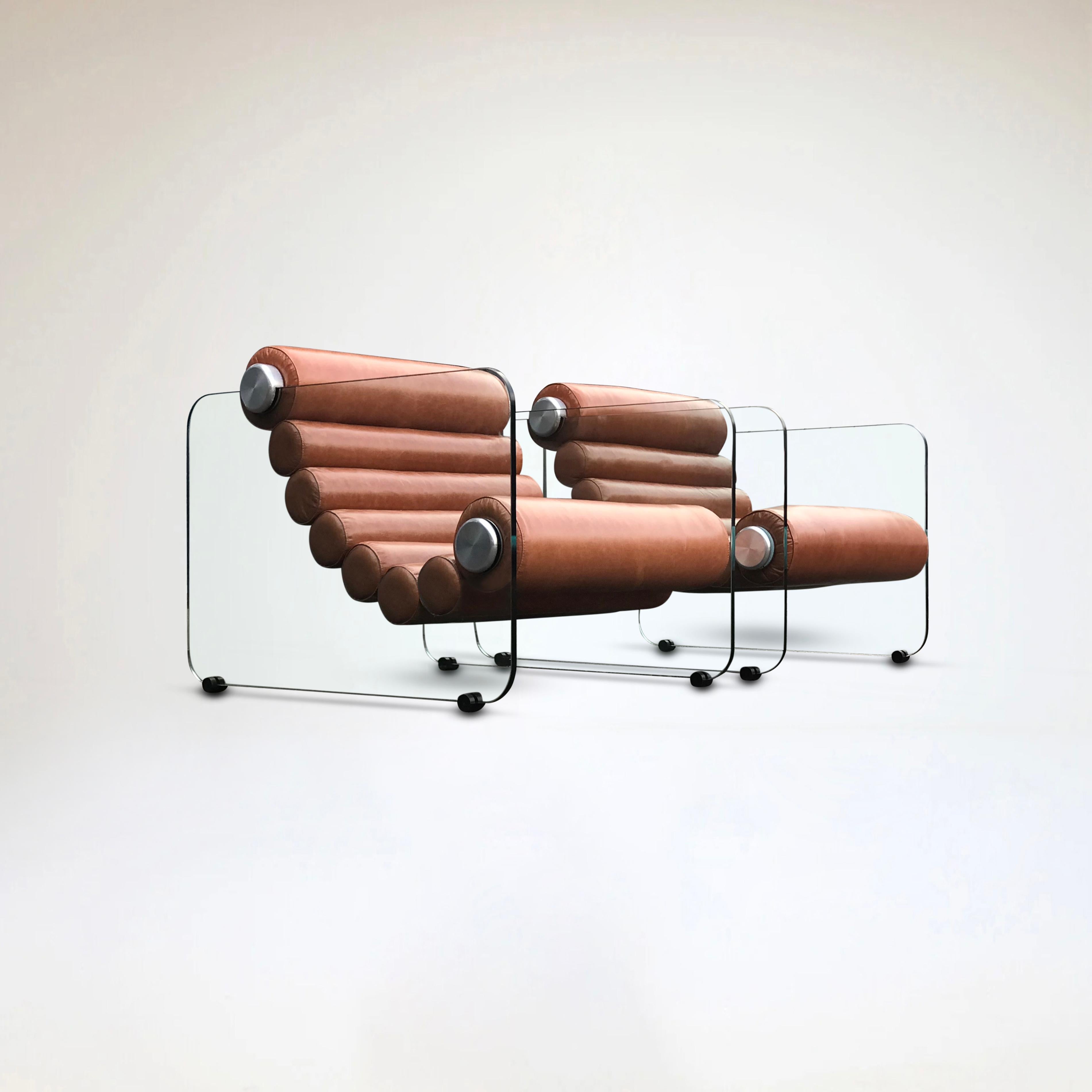 Italian space age design by Fabio Lenci, the Hyaline (pronounced as “Hay’Line) chairs are a prime example of Italian design of the time period.

The thick leather rolls are interconnected in a flexible form and are fixed to the glass plates on the