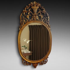 George III Carved Giltwood Oval Wall Mirror c1770