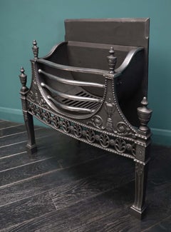 An Elegant 19th Century Wrought & Cast Fire Grate in the Neo-Classical Manner
