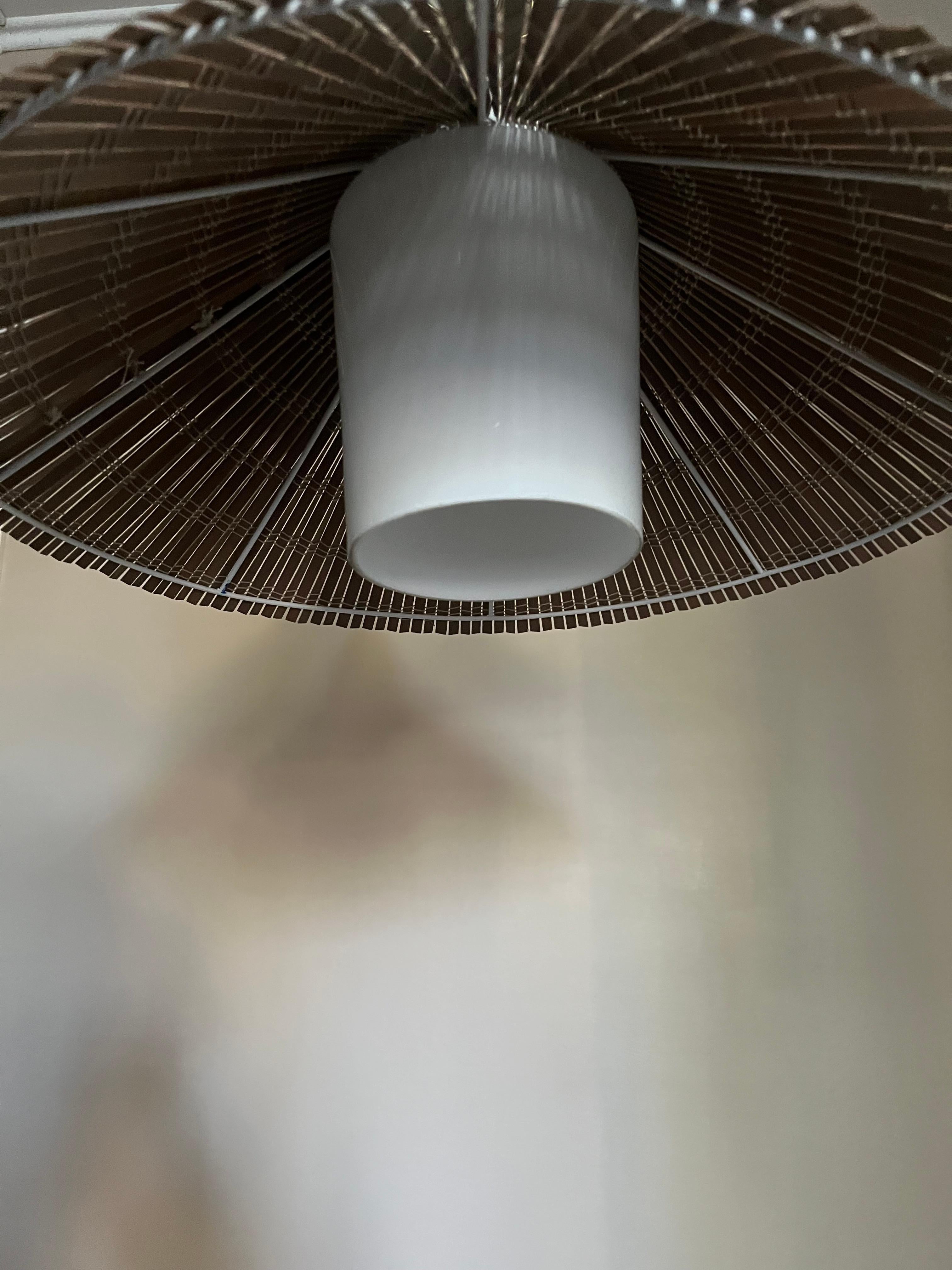 Finnish Paavo Tynell model 1082 for Idman, rattan shade, circa 1960. For Sale