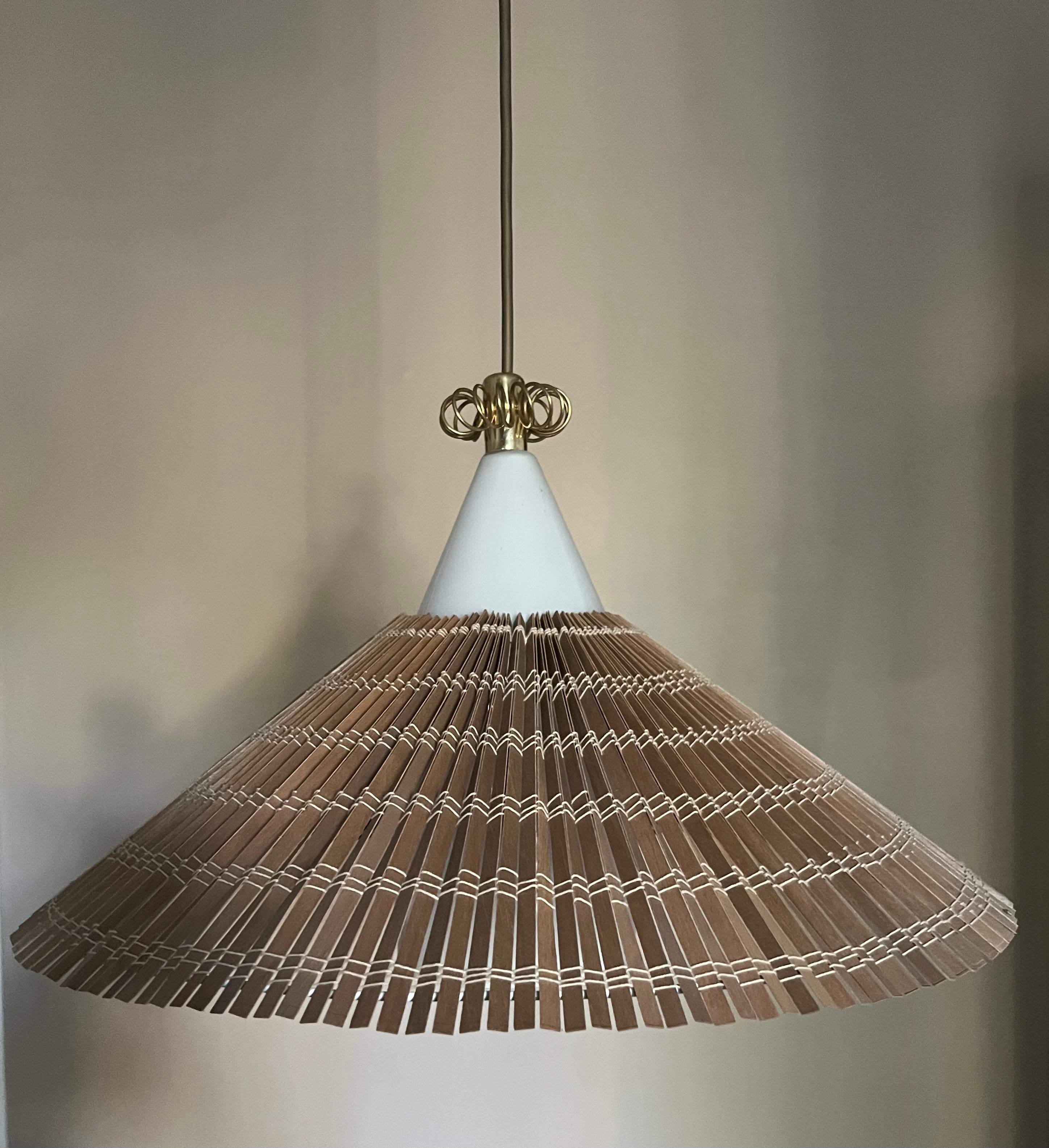 Scandinavian Modern Paavo Tynell model 1082 for Idman, rattan shade, circa 1960. For Sale