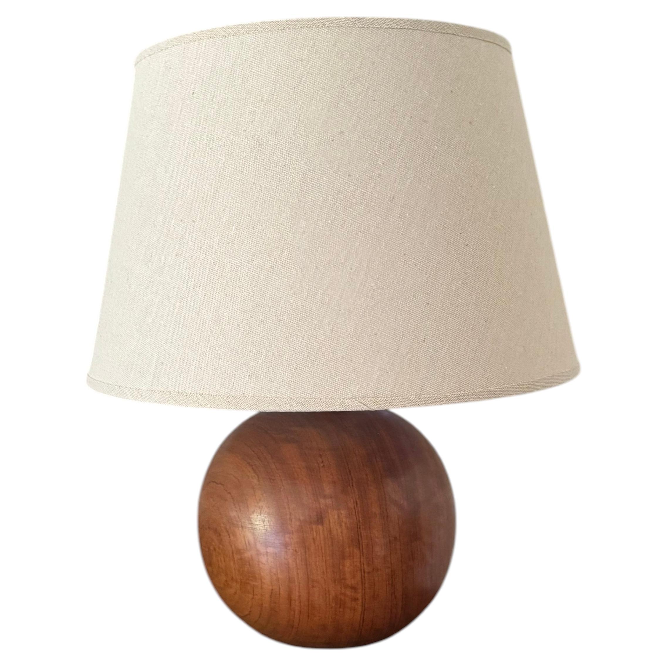 French 1960’s solid wooden sphere lamp.