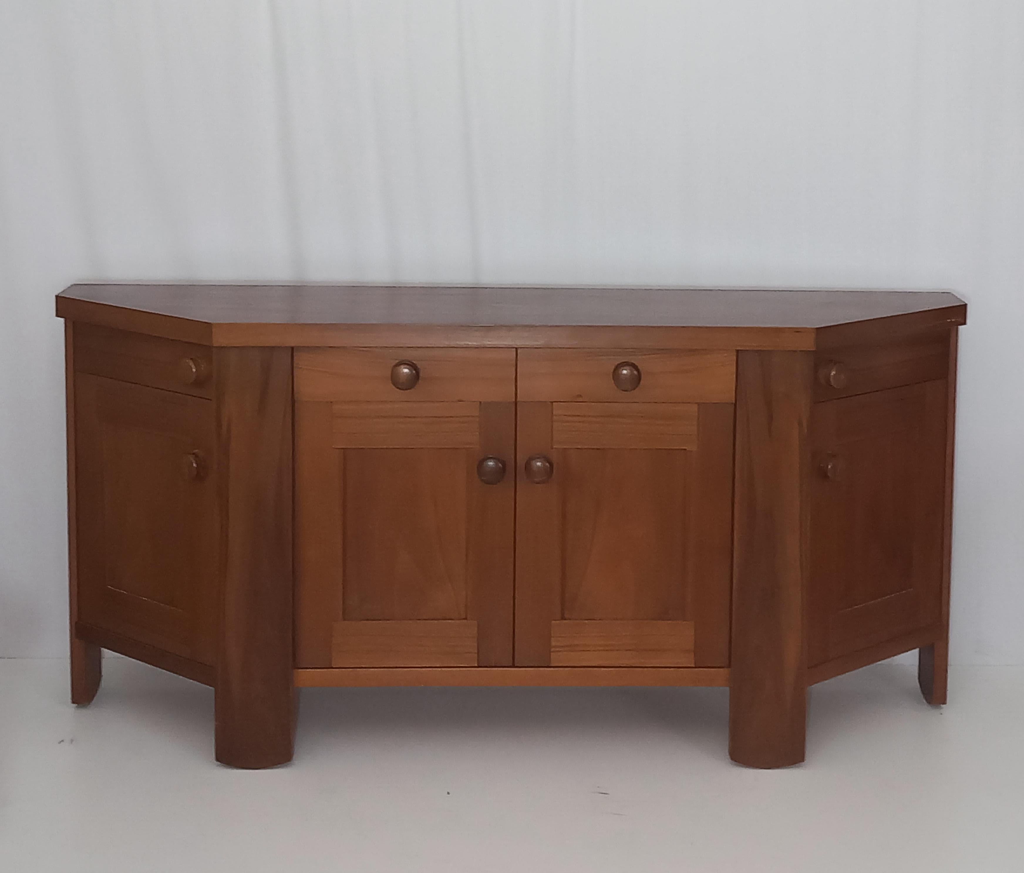 Discover the timeless appeal of mid-century modern Italian design with this exquisite vintage walnut sideboard, designed by the iconic architect and designer Silvio Coppola and produced by the renowned Italian furniture firm Bernini in the 1970s.