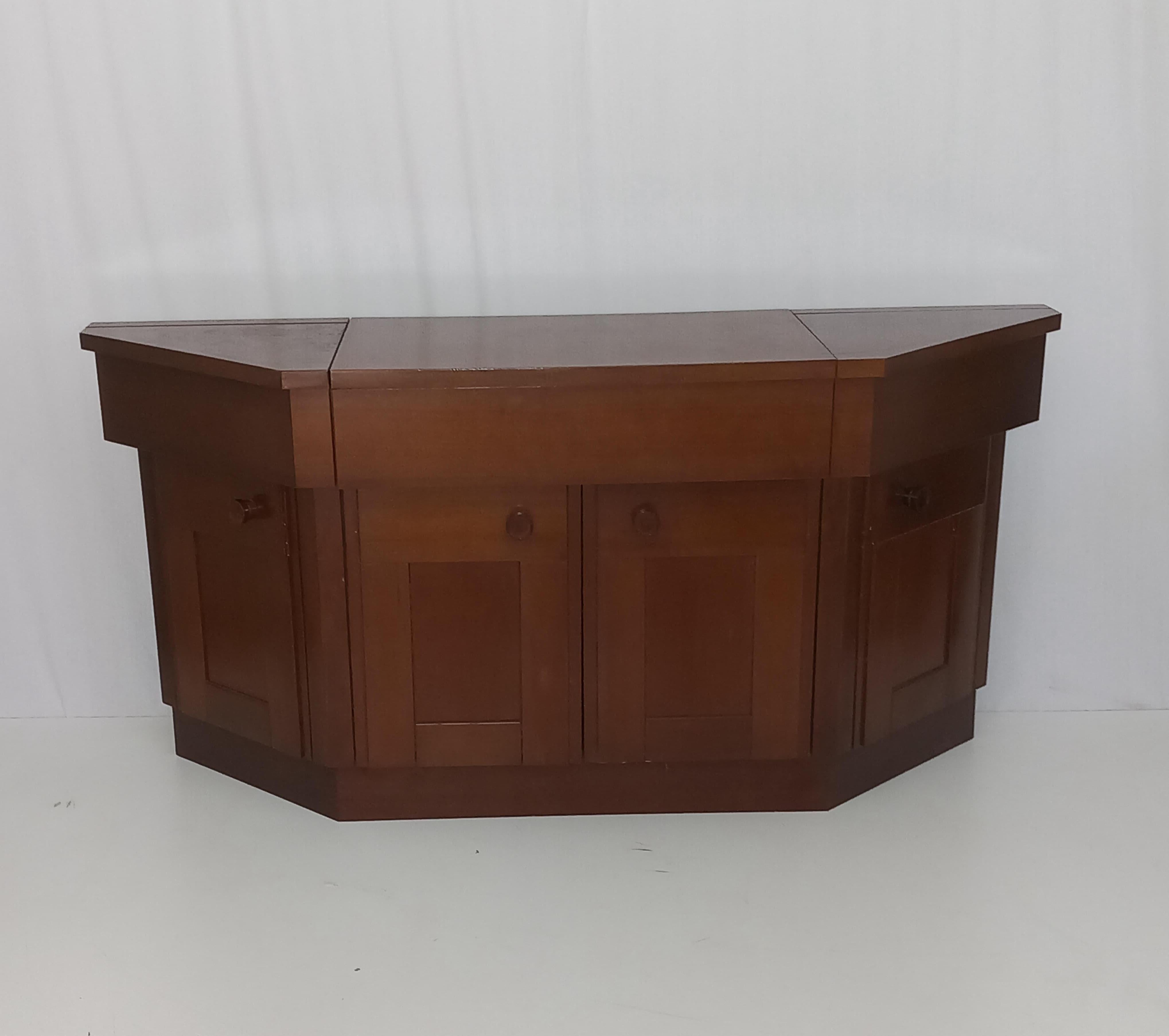 Elevate your space with this vintage mid-century modern bar cabinet sideboard, a stunning piece designed by the iconic architect and designer Silvio Coppola and produced by the renowned Italian furniture firm Bernini in the 1960s. Expertly crafted