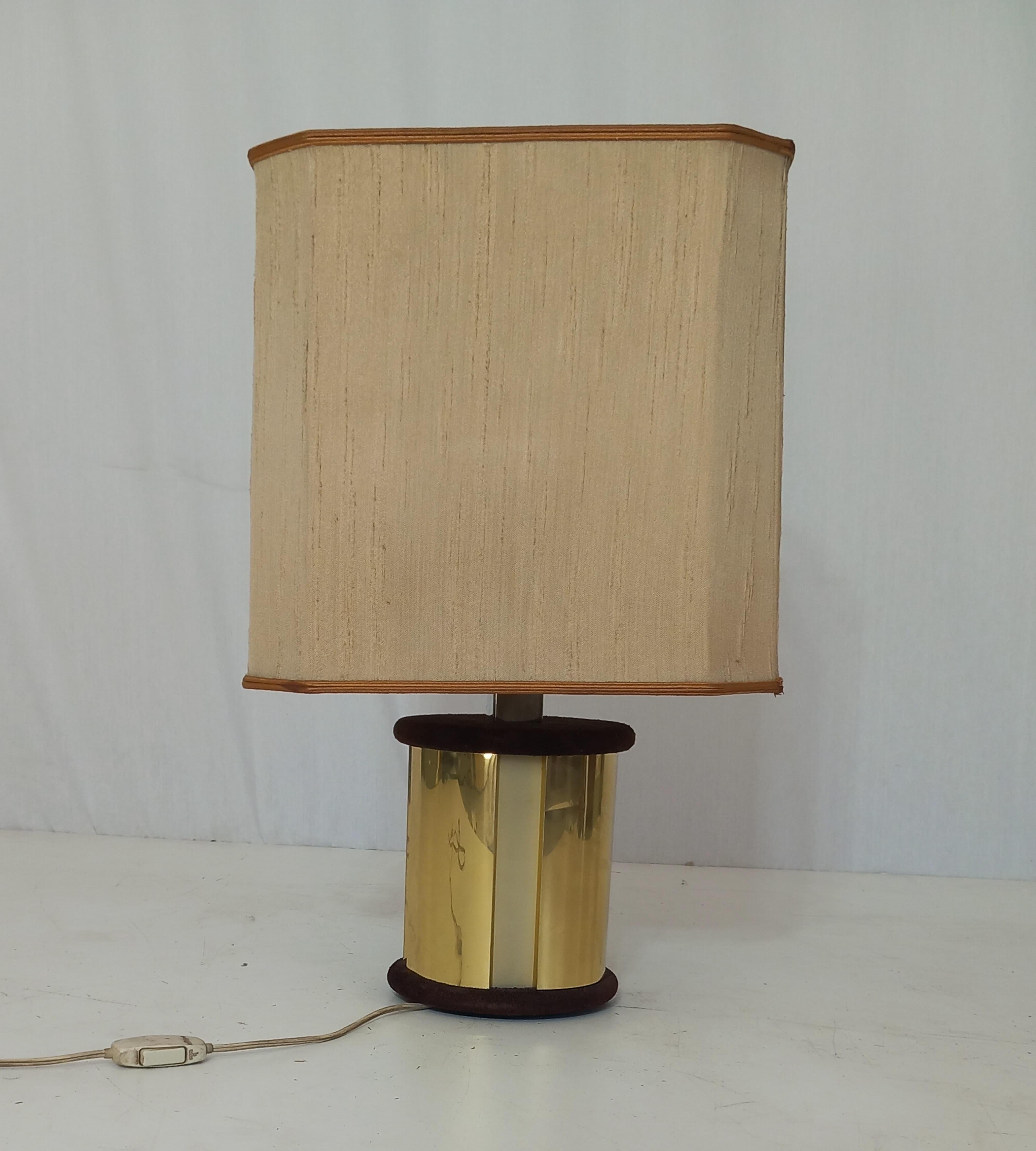 Bring a touch of mid-century charm to your space with this vintage table lamp from the 1960s, crafted in elegant brass with timeless appeal.                                           With its classic style and warm metallic finish, this lamp is the