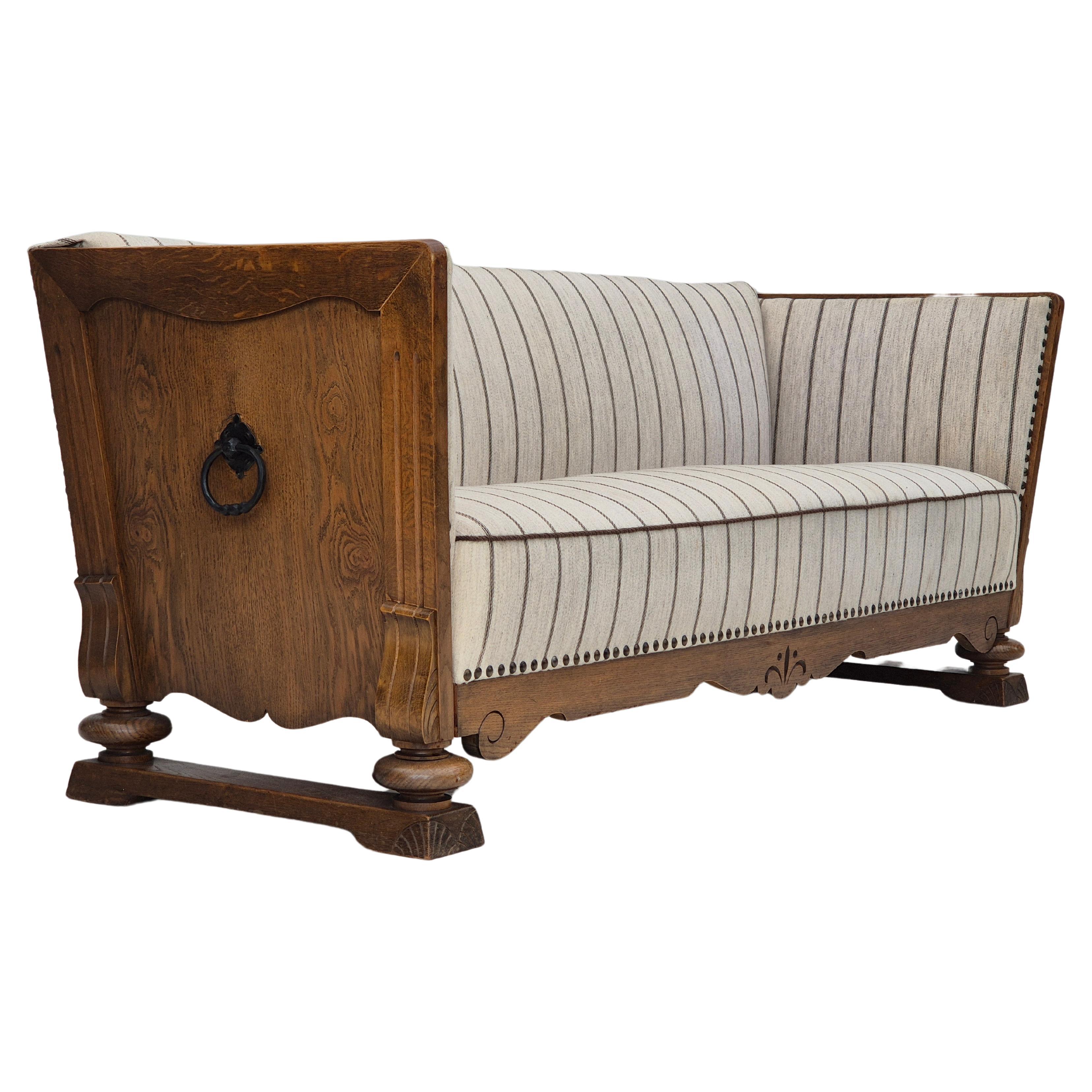 1950s, Danish 2 seater sofa in quality furniture wool, oak wood. For Sale