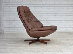 Anni '70, design danese di Madsen & Schubell, poltrona girevole regolabile.