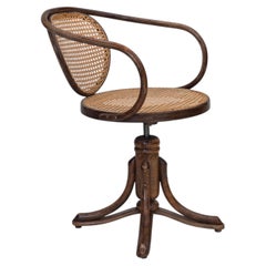 1950s, swivel armchair, bent wood, furniture mesh.