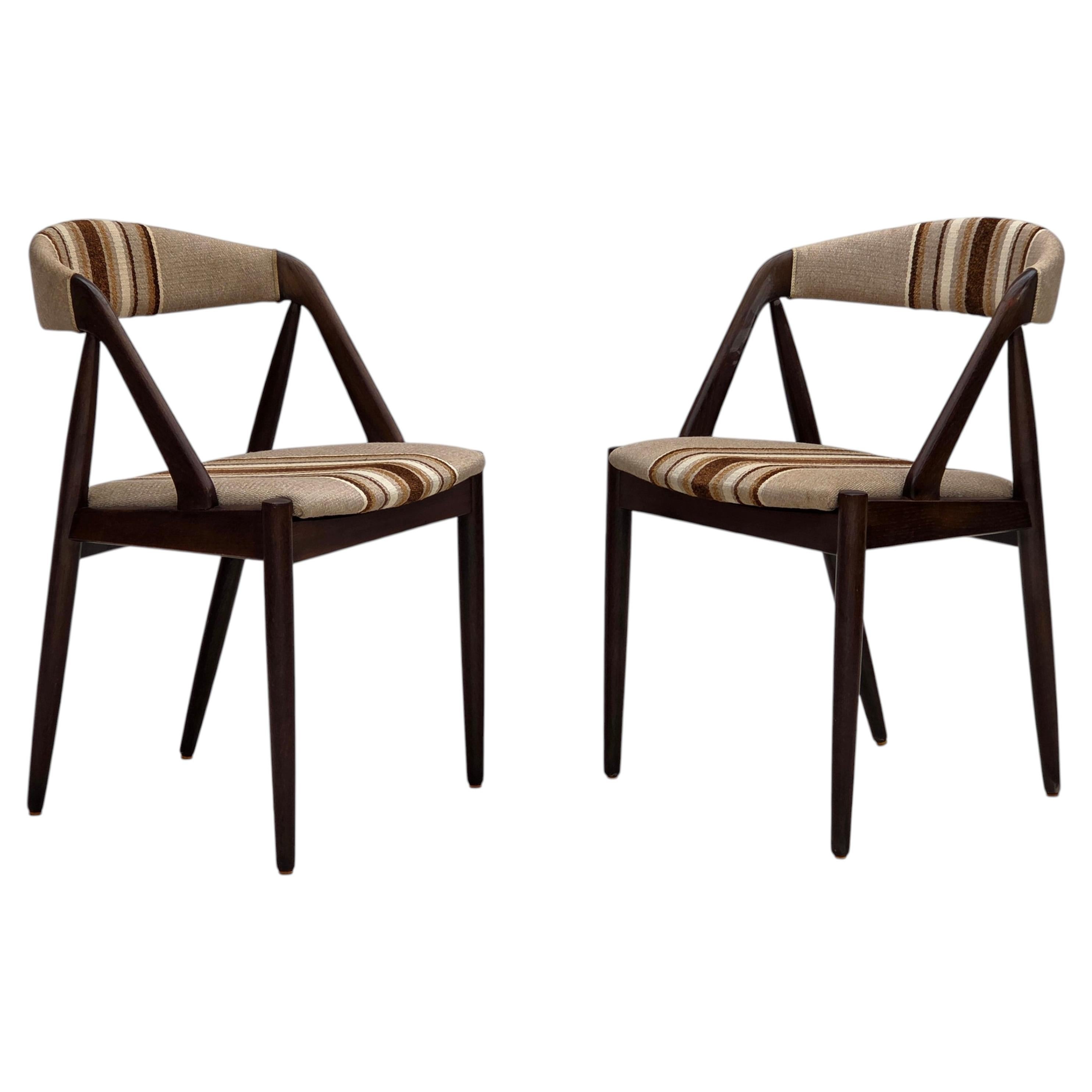 Années 1960, création danoise de Kai Kristensen, modèle 31, paire de fauteuils. en vente