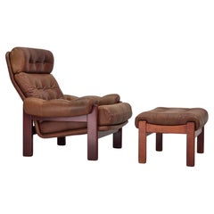 1970s, Swedish design, armchair with footstool, furniture leather.