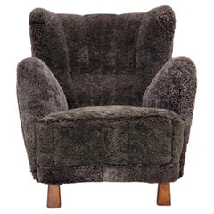 1960s, Danish design, reupholstered armchair, genuine sheepskin.