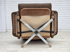 1970s, Danish swivel armchair with footstool, leather, stainless steel.