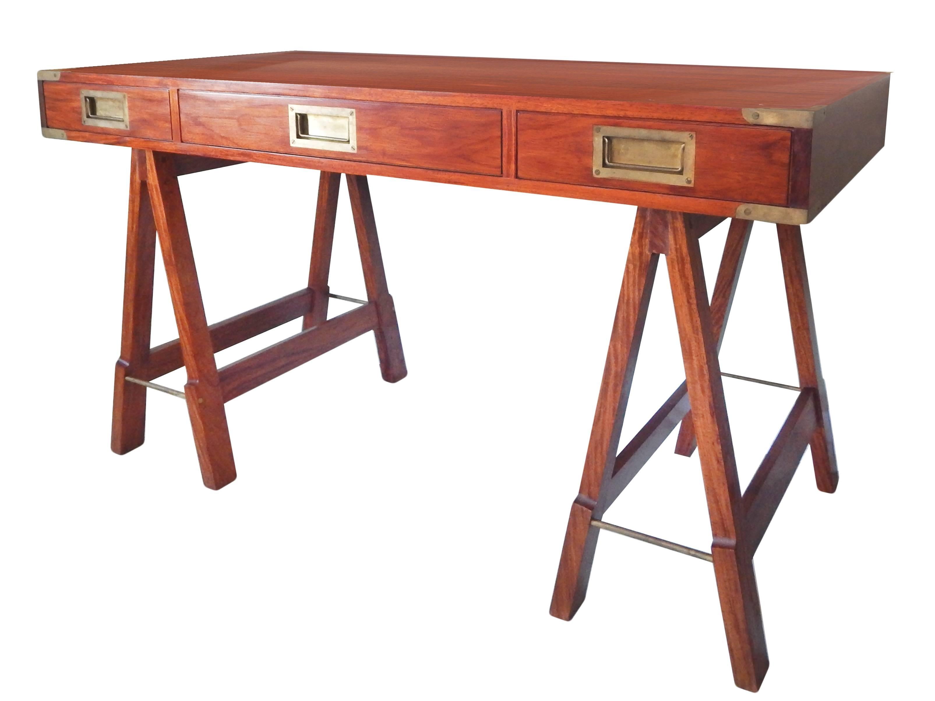 Campaign desk on saw horse style legs with high quality hardware. In excellent condition.