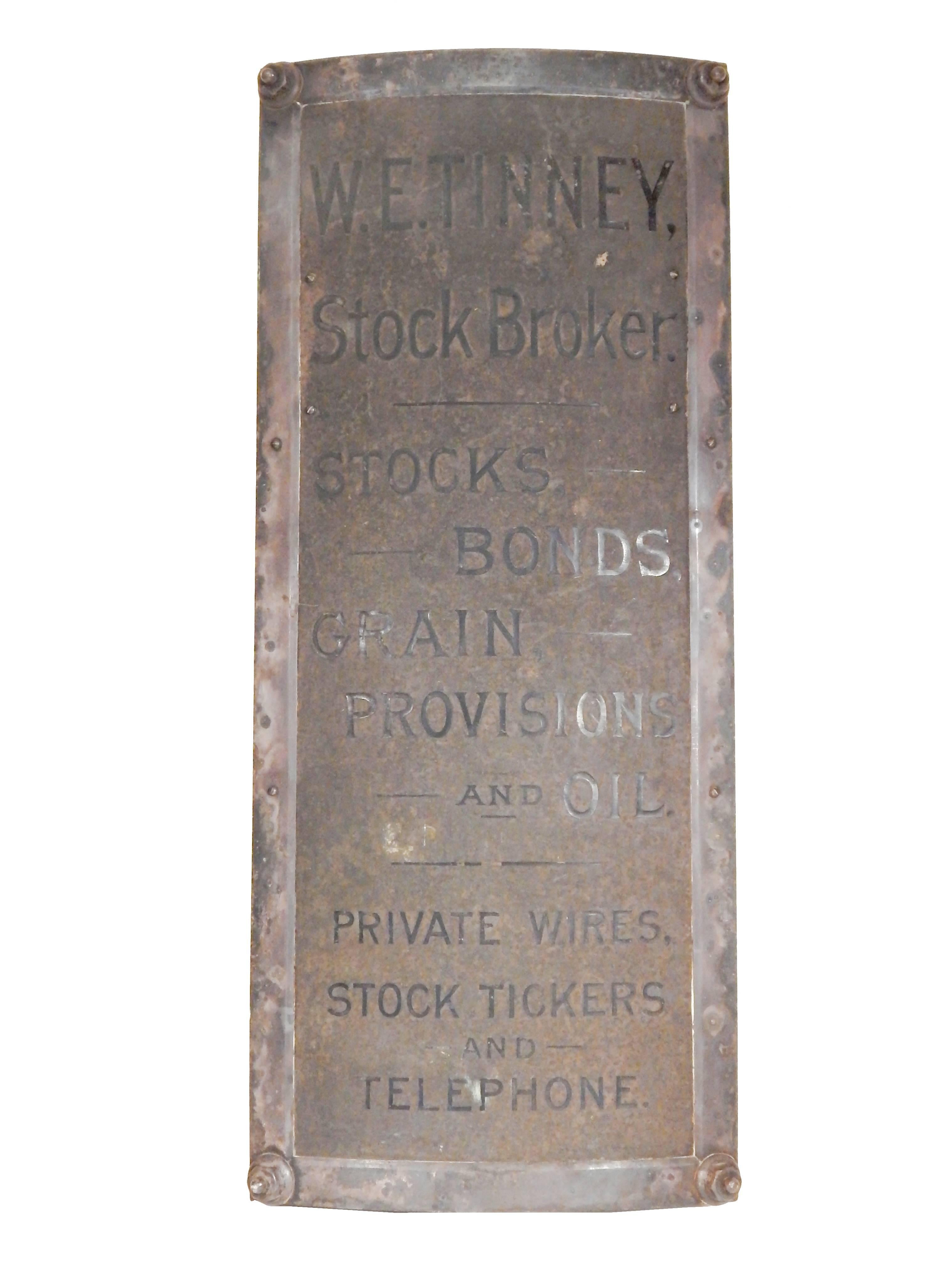 Early metal stock broker sign.