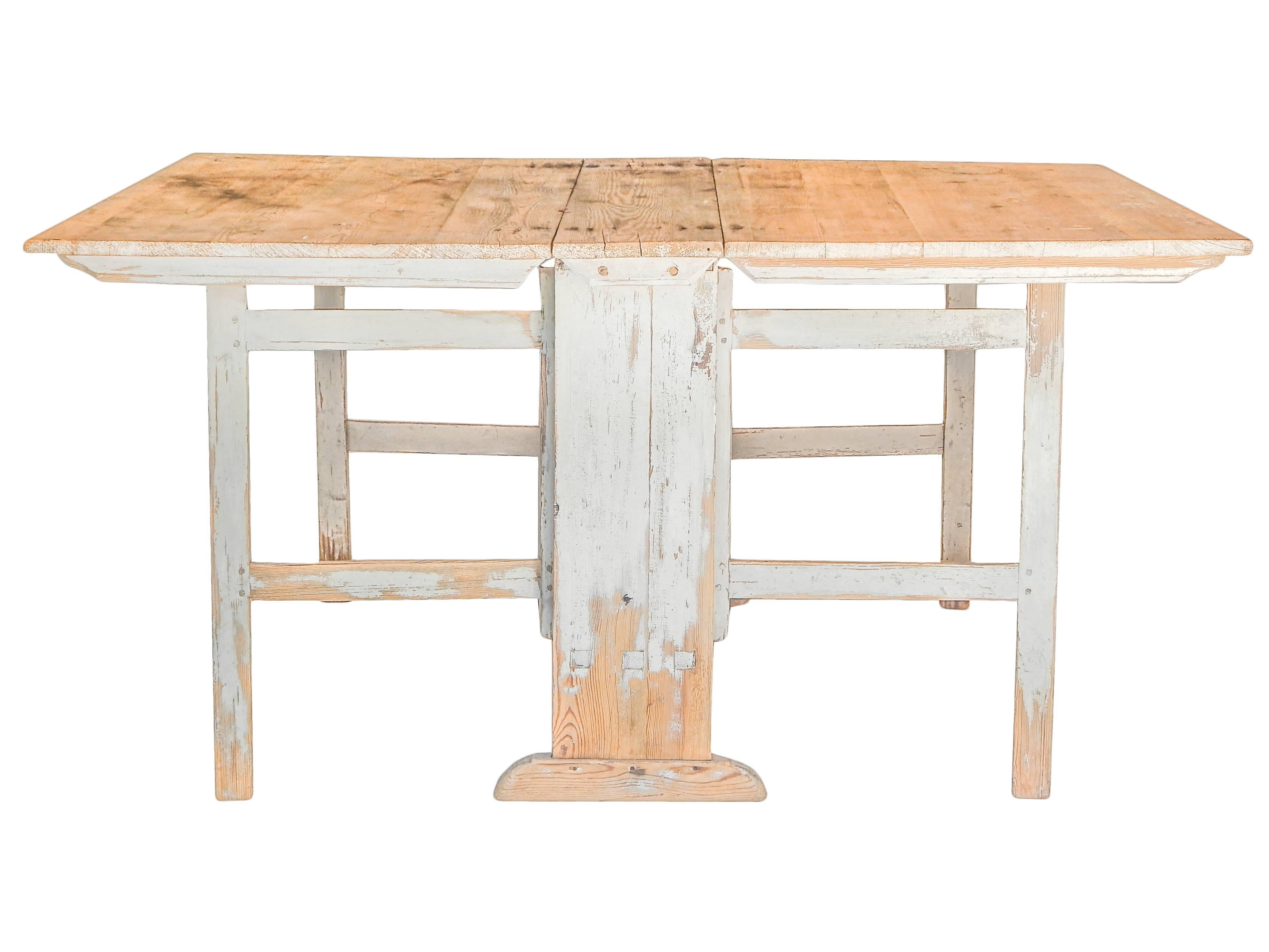 Drop leaf slagbord dining table from Sweden.
Depth when closed: 14 1/2
