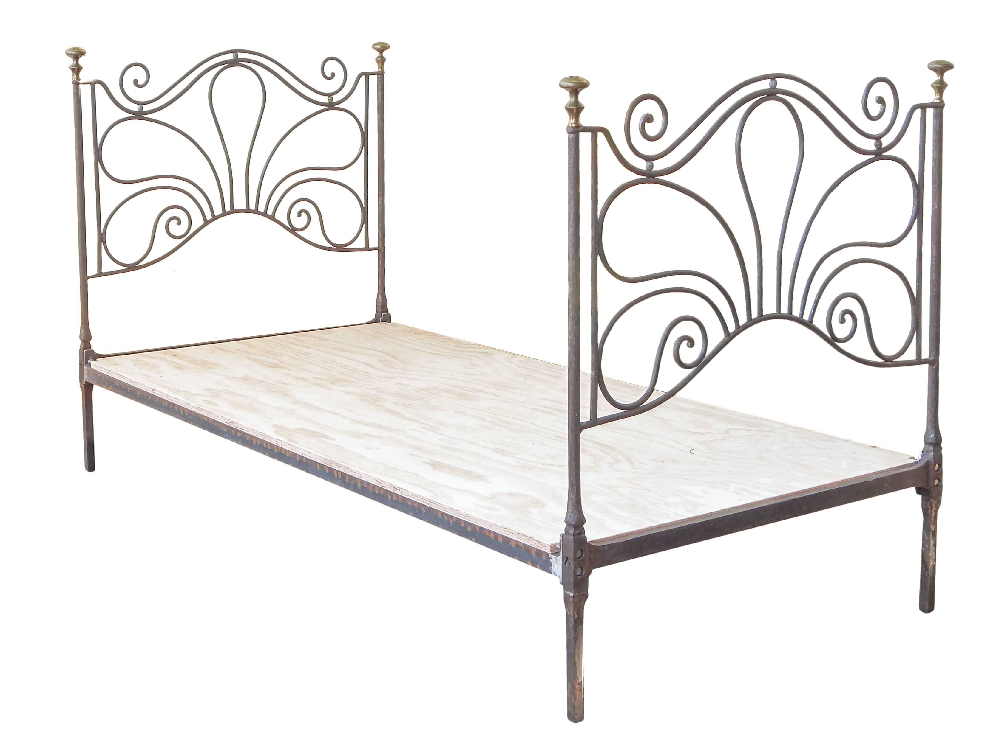 French iron and brass daybed. New rails. Mattress board included.
Interior 77” inches long.