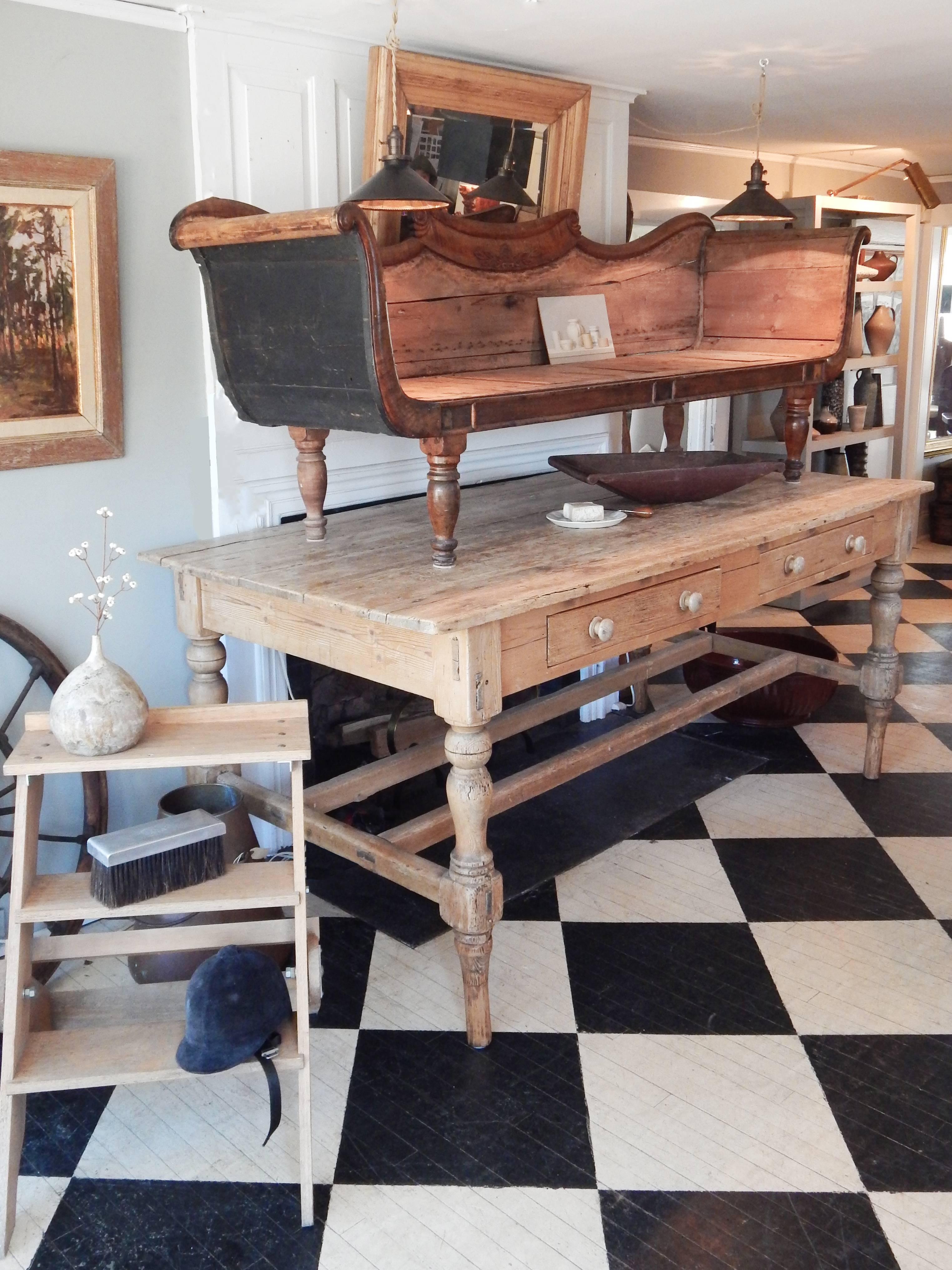 Exceptional French pine work table with drawers. Legs have been extended to create a kitchen island/ work surface. Incredible aged patina.
Clearance under drawers 29 1/4 inches.