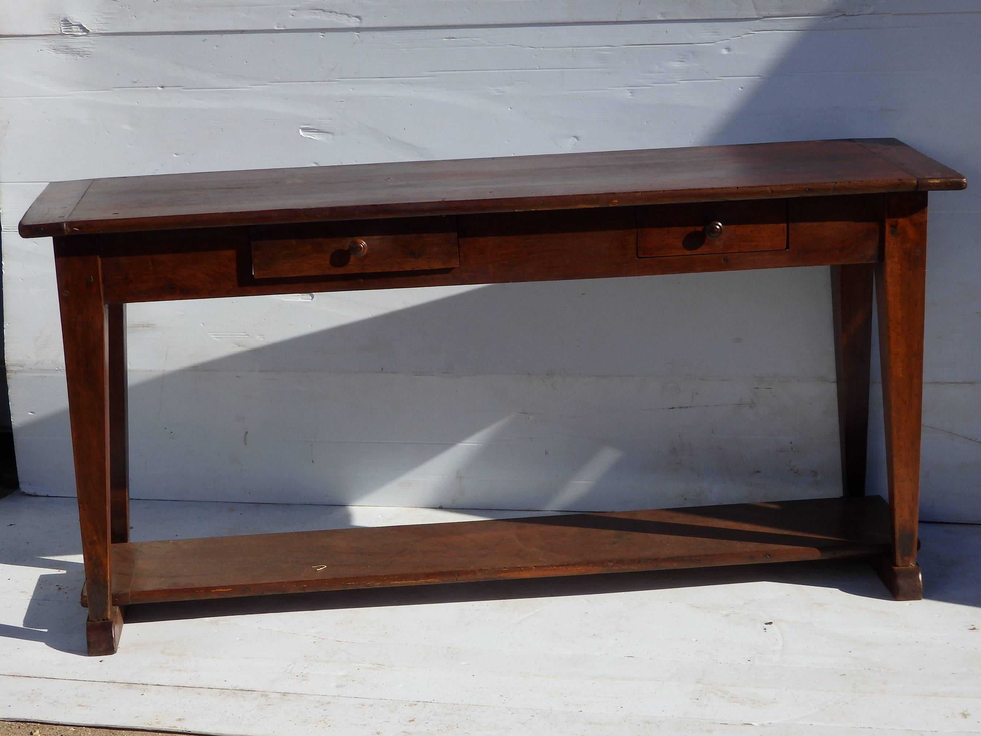 Console of Sofa table with 2 drawers of different sizes, tapered legs end below a lower shelf. Breadboard ends, fruitwood. c 1880