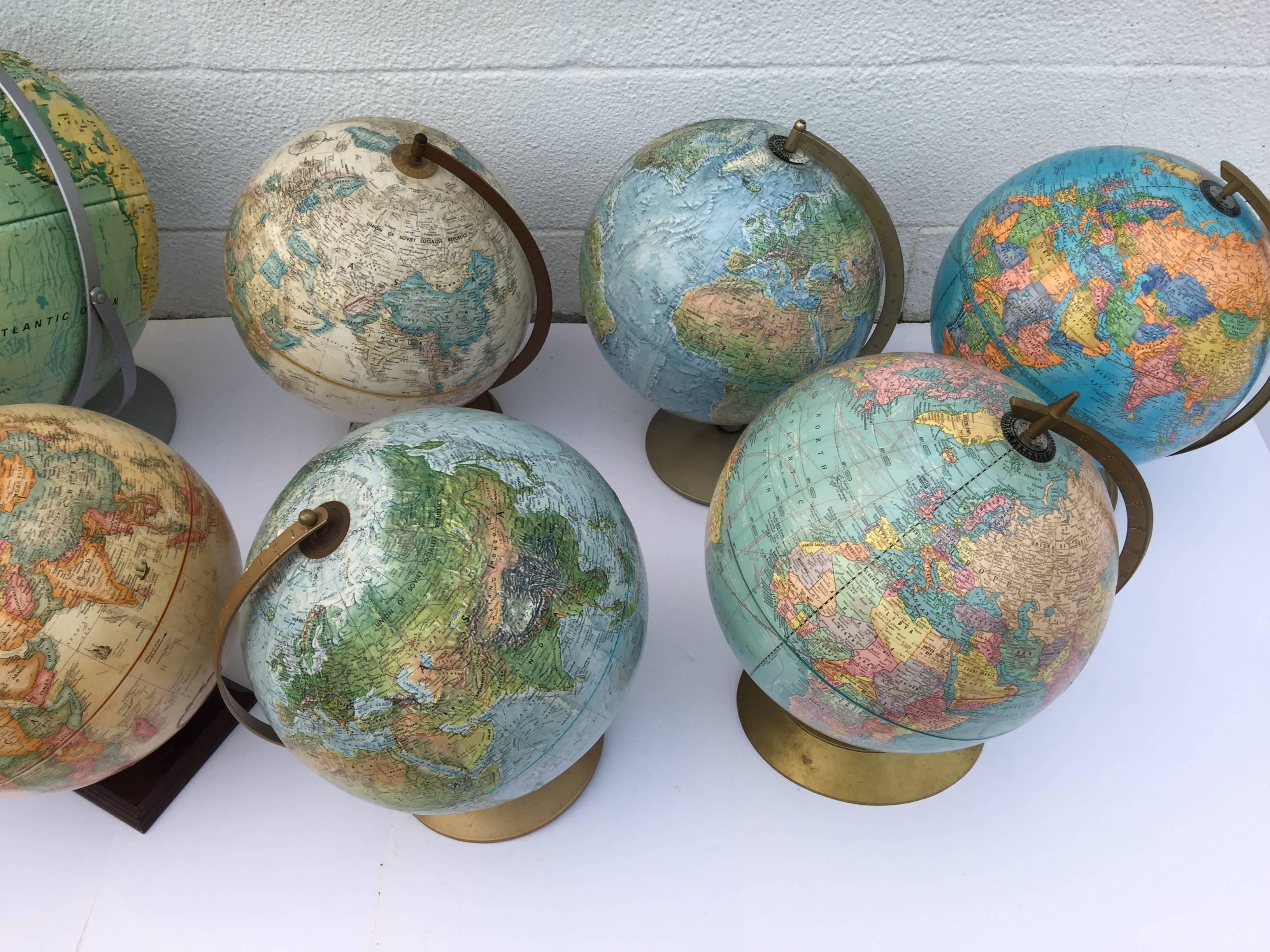 We have a collection of vintage globes in various sizes and colorways. Priced separately:
From left to right, back row $225, $750, $275, $225, $ 200.
Front row: $450, $325, $275, $300, $225.