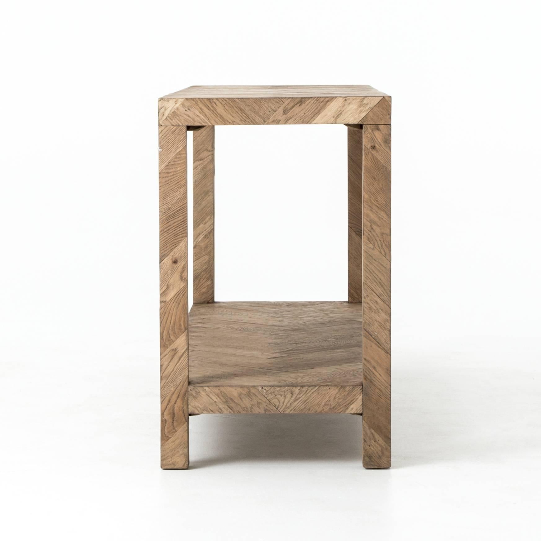 Parsons style console table in oak, with herringbone parquet pattern.