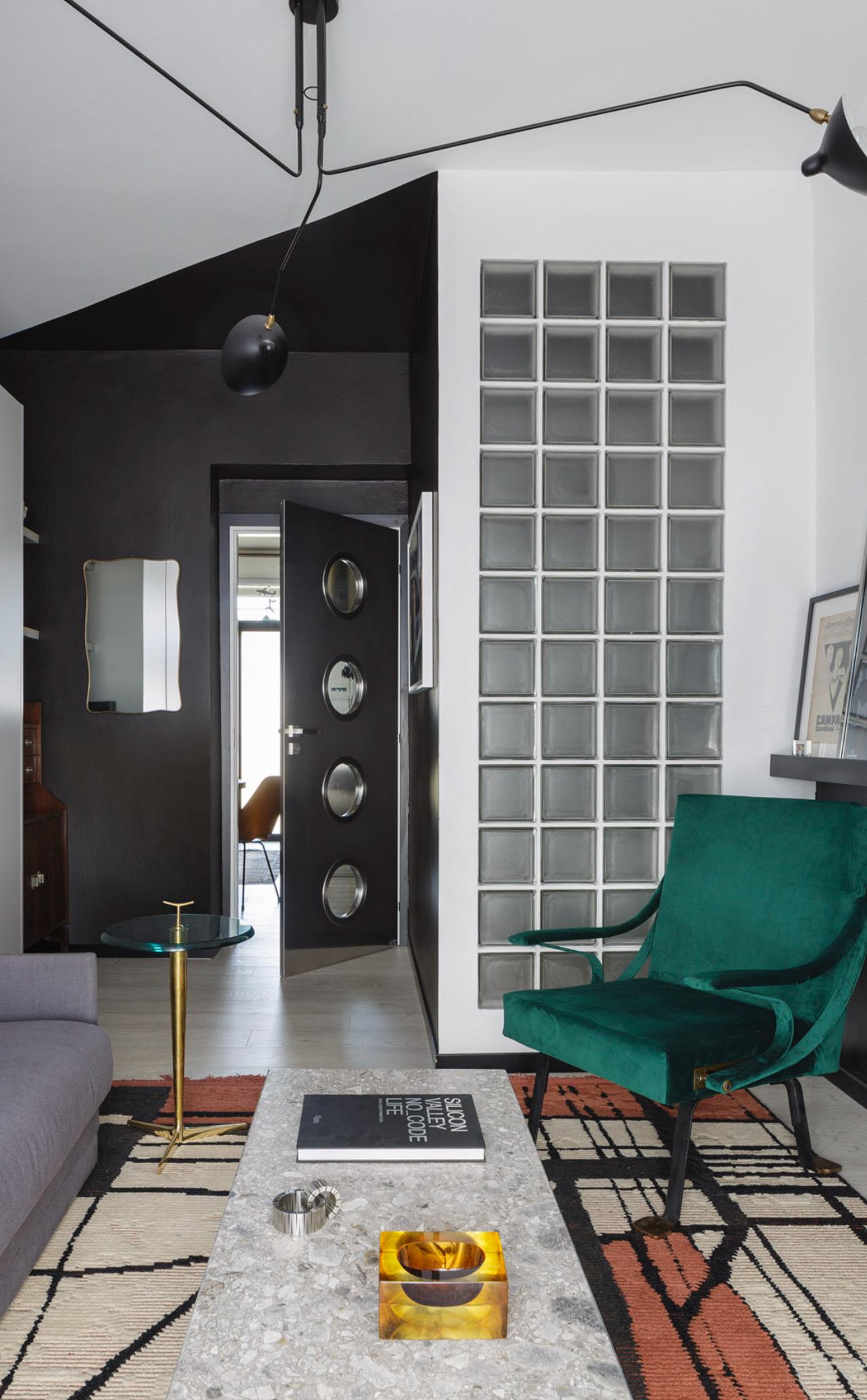 Puerta metálica contemporánea de acero inoxidable Spinzi hecha a medida con ojos de buey redondos Italiano en venta