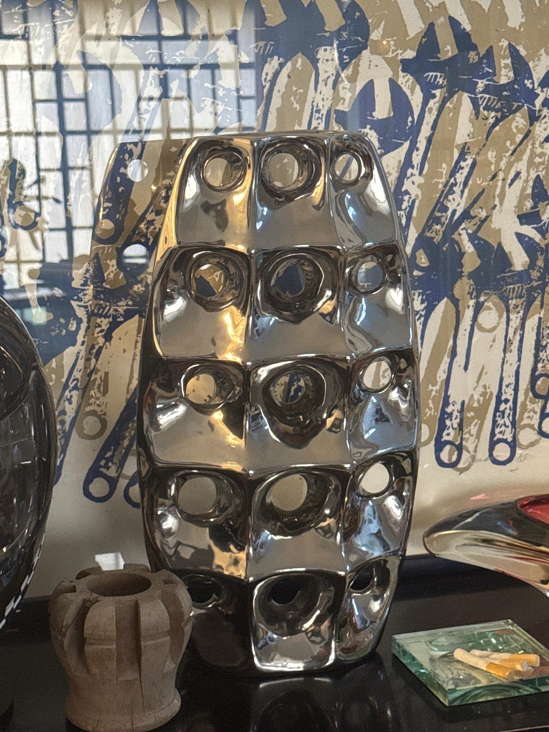 Late 20th Century sculptural & Rare Ceramic Vase in Chrome Finish, with holes