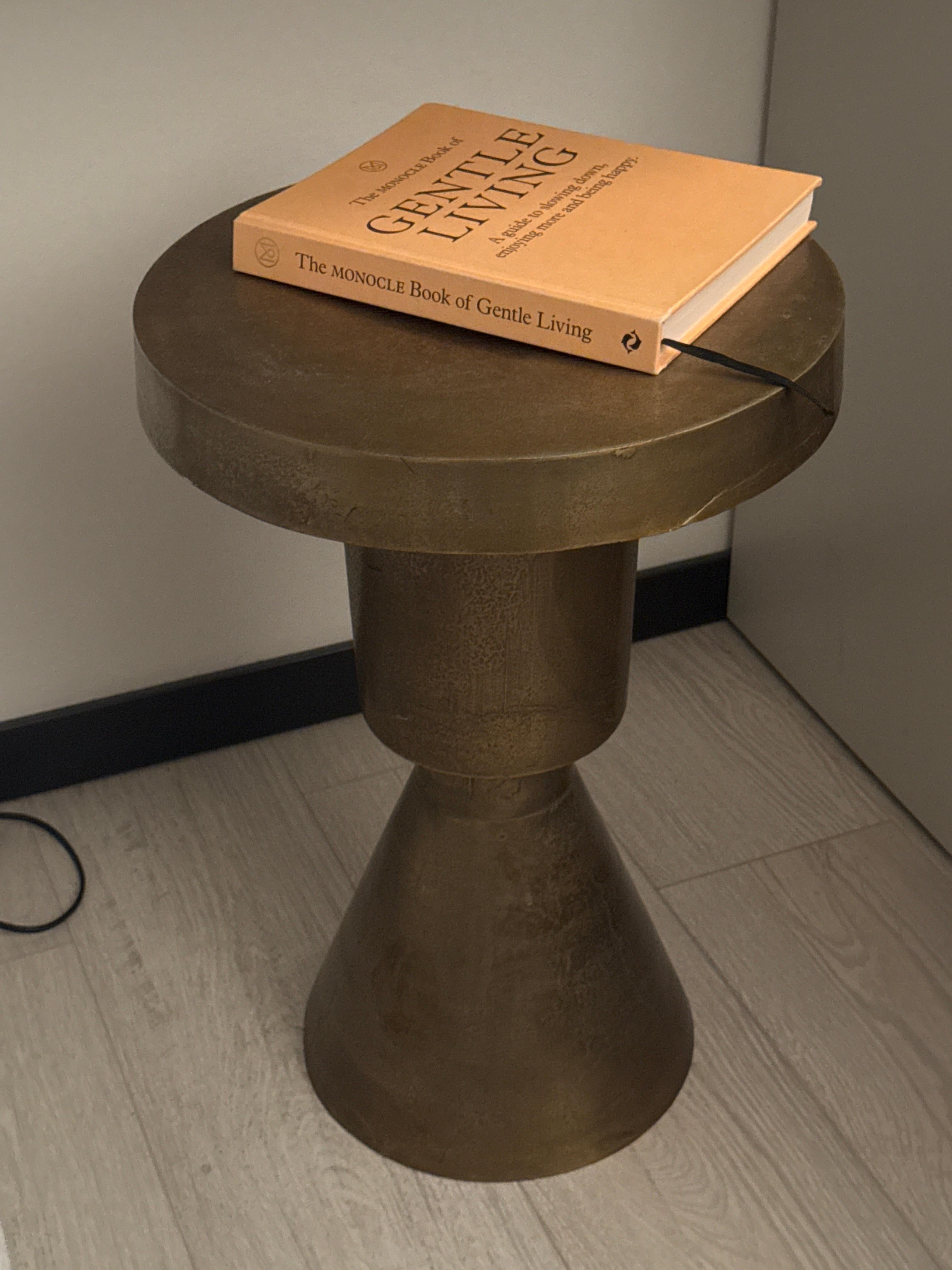 sculptural metal side table, contemporary brassy side for modern interiors