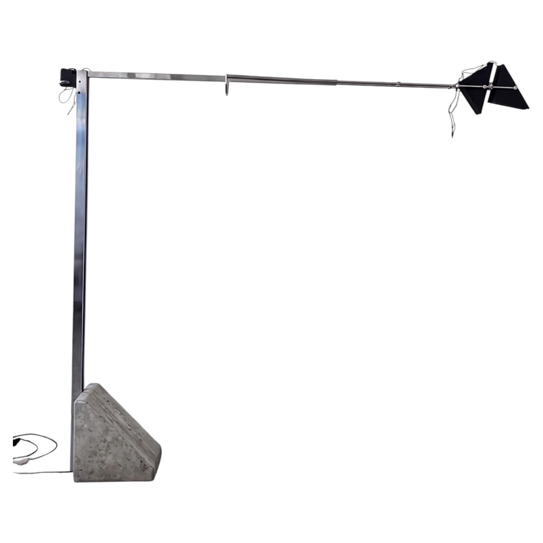 Late 20th Century Monunmental floor lamp with a travertine base & extending arm