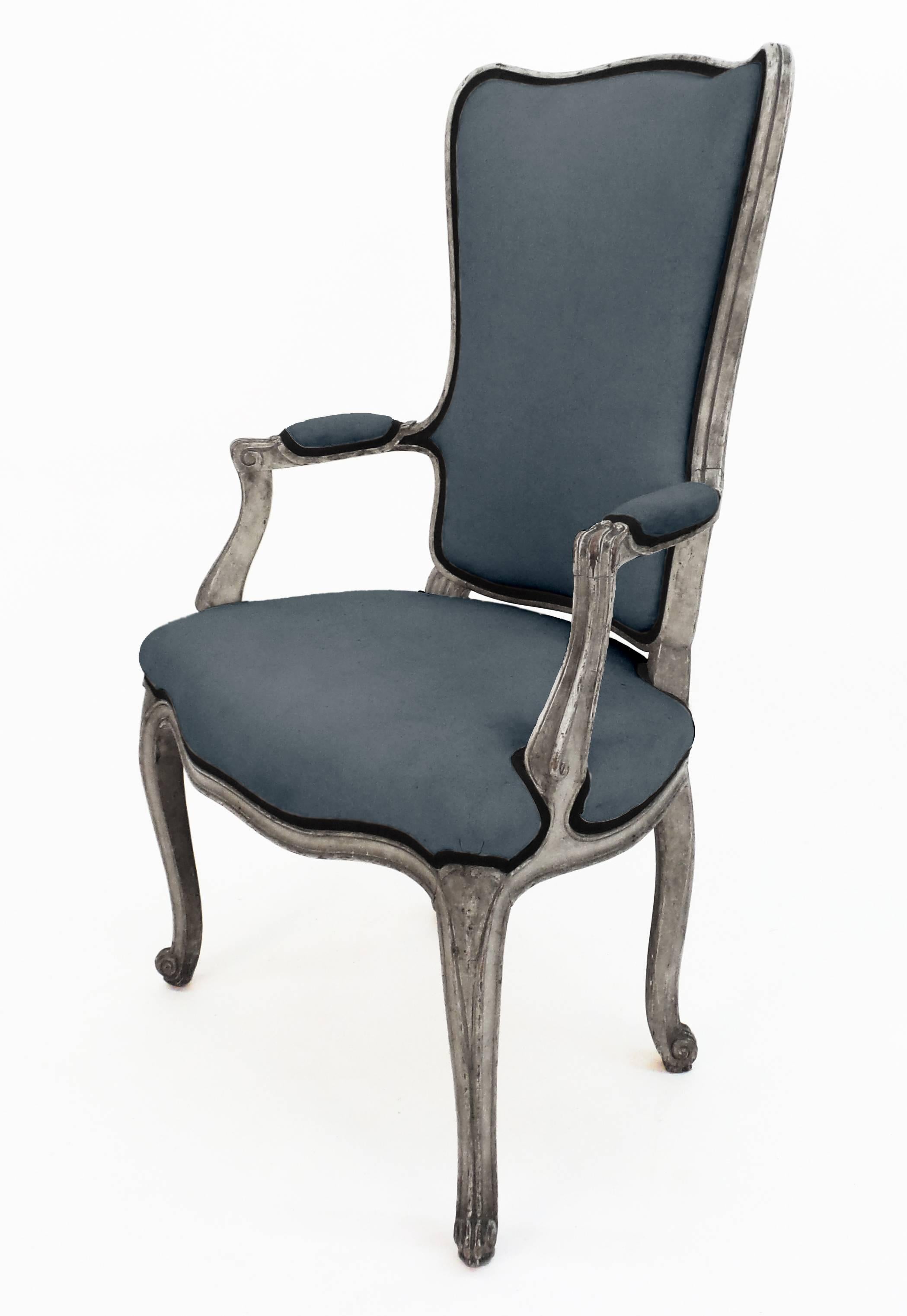 The Beistegui model Louis XV style high back open-arm dining chair, based on Carlos de Beistegui's original and depicted in the painting of Mr, Beistegui's apartment by Jeremiah Goodman. Custom upholstery and finish options available on request.
