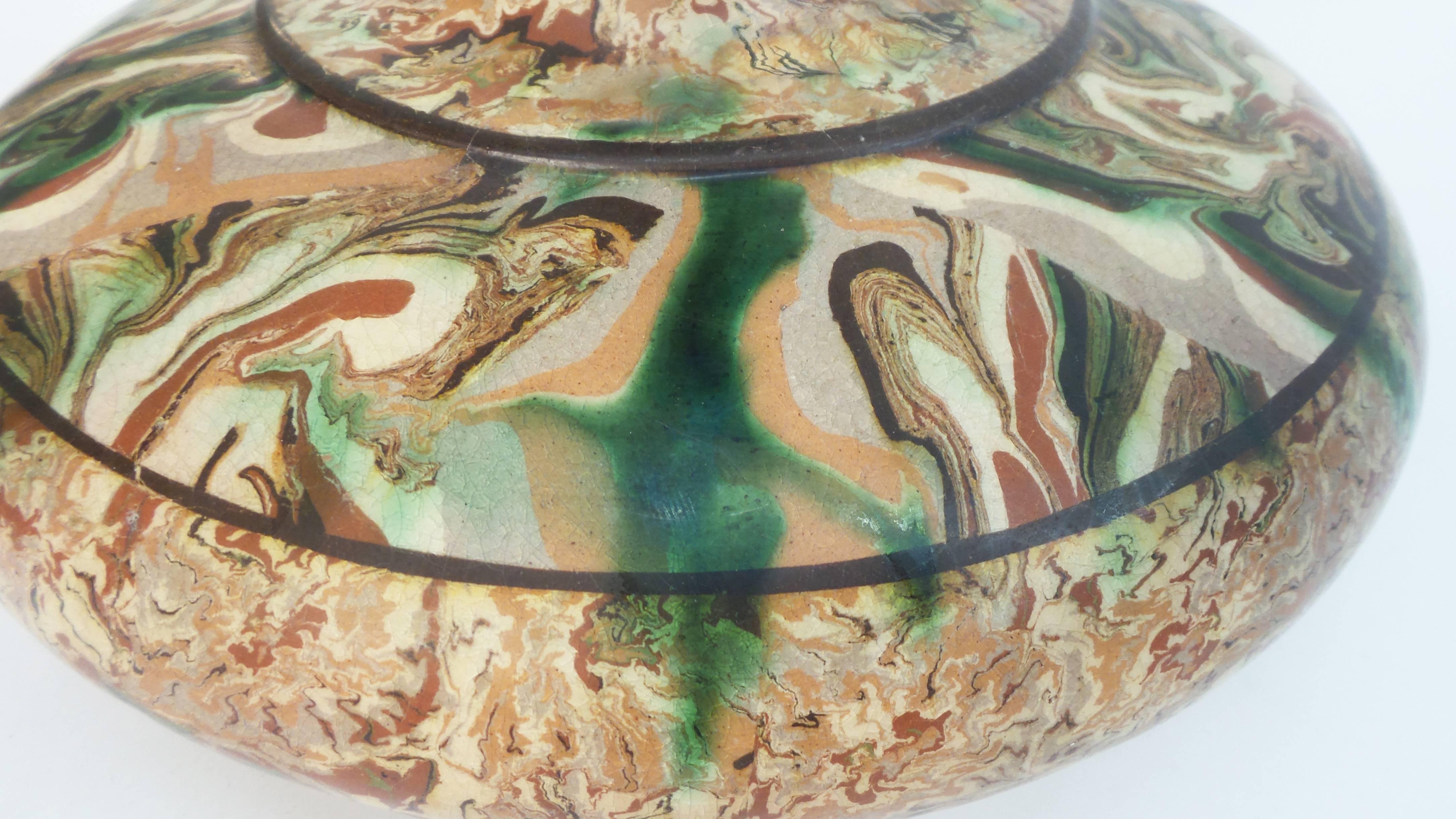 A 19th century mixed earth pottery vase by Pichon highlighting the mixed earth technique with bands of alternating composition scale. Signed. Uzes, France, circa 1890.