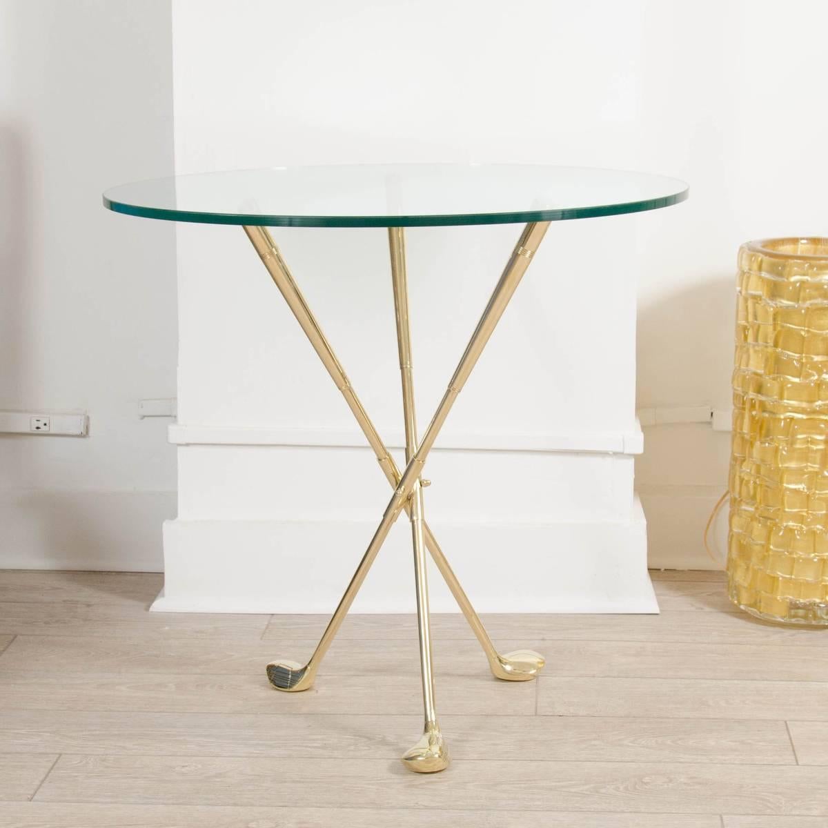 Circular glass table with brass tripod 