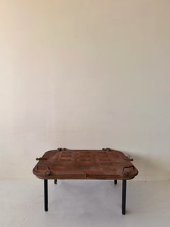 Brutalist patinated industrial hatch coffee table