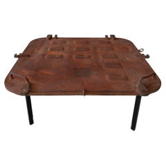 Brutalist patinated industrial hatch coffee table