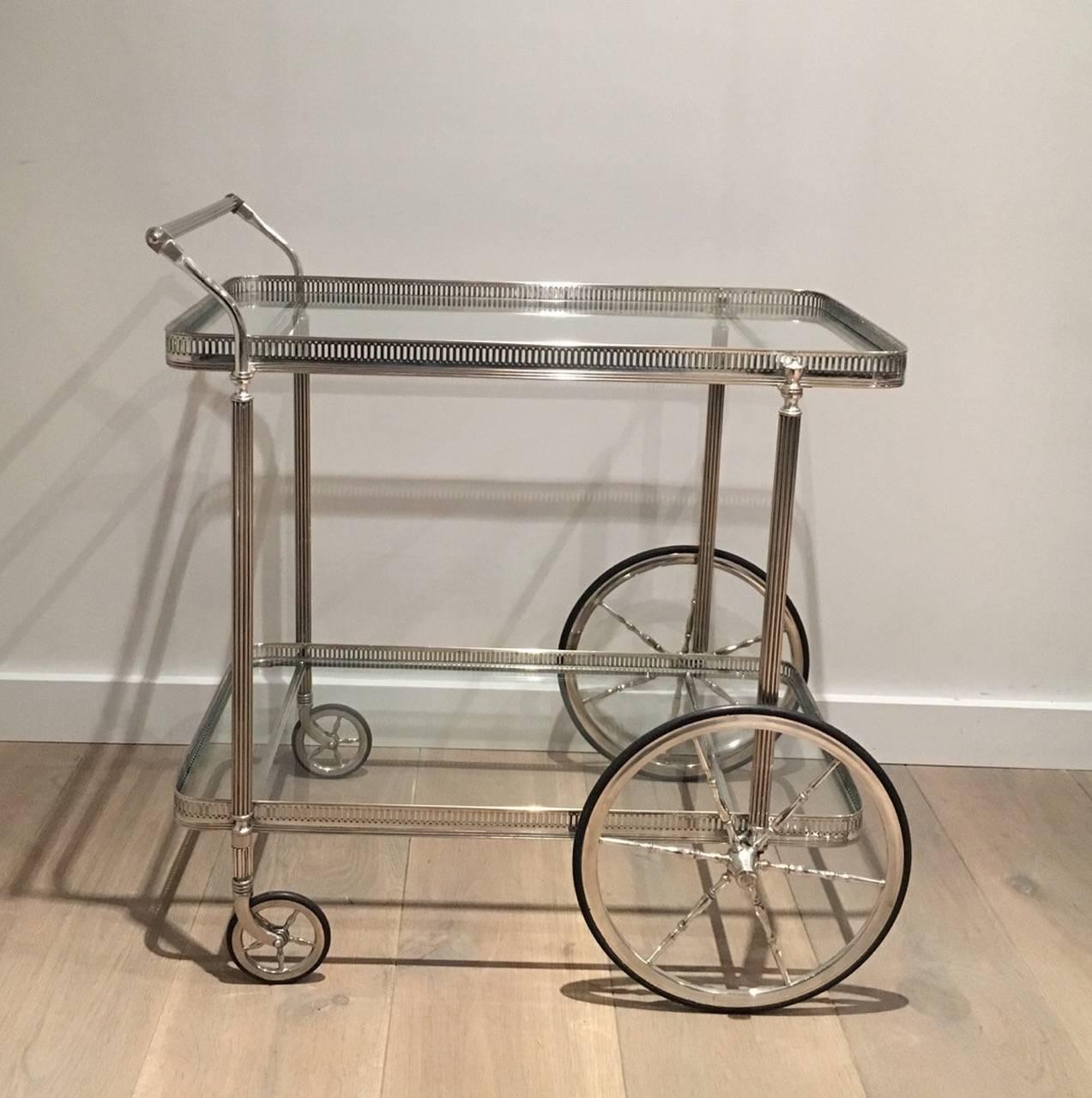 Rare neoclassical style silver trolley/bar cart.