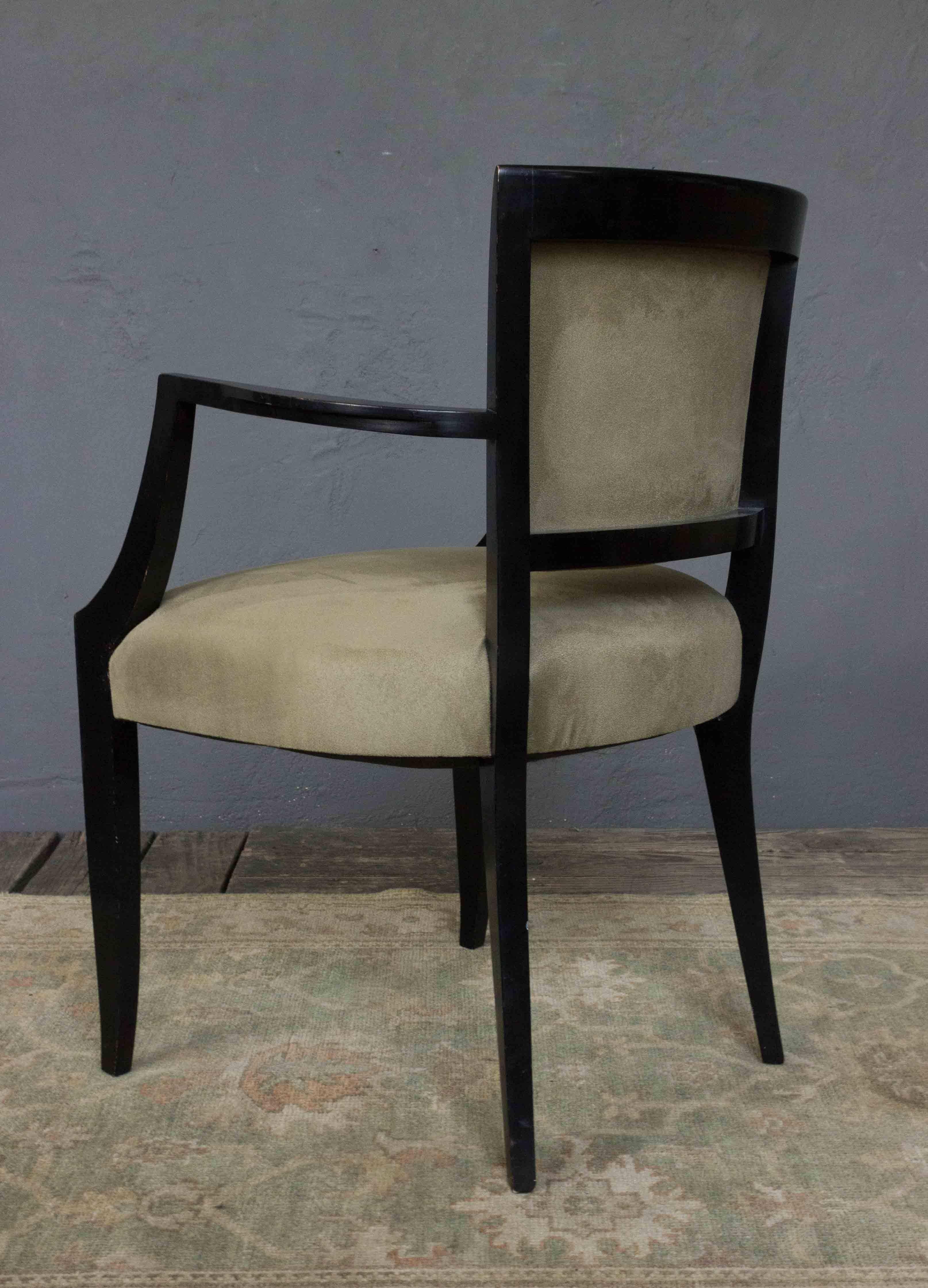 An exceptional reproduction of a 1940s Normandy style armchair. Bring an air of effortless grace and timeless sophistication to your home with this armchair. This piece is an exquisite reproduction of a classic French 1940s design, carefully crafted