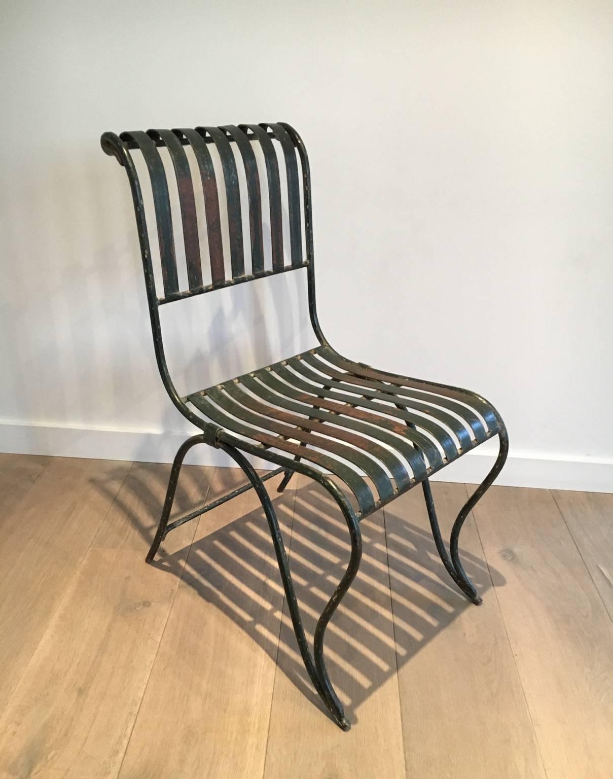 An unusual wrought iron garden chair with a beautiful painted dark green painted patina. French, circa late 19th century. 


This item is currently in France, please allow 2 to 4 weeks delivery to New York. Shipping costs from France to our