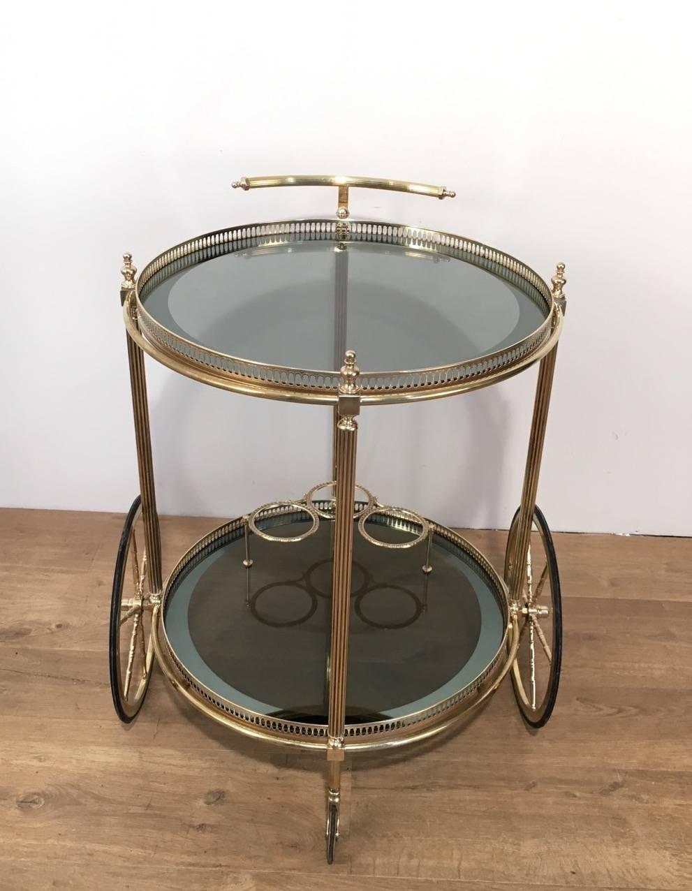 Neoclassical Style Round Brass Bar Cart with Blue Glass Attributed to Jansen In Excellent Condition In Buchanan, NY