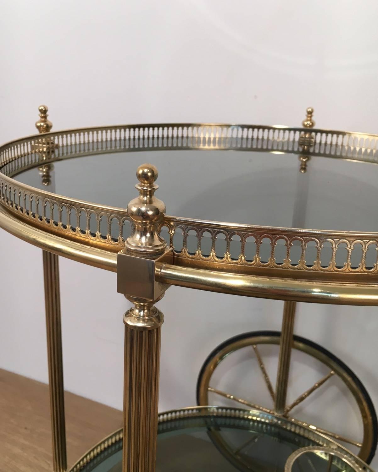 Mid-20th Century Neoclassical Style Round Brass Bar Cart with Blue Glass Attributed to Jansen