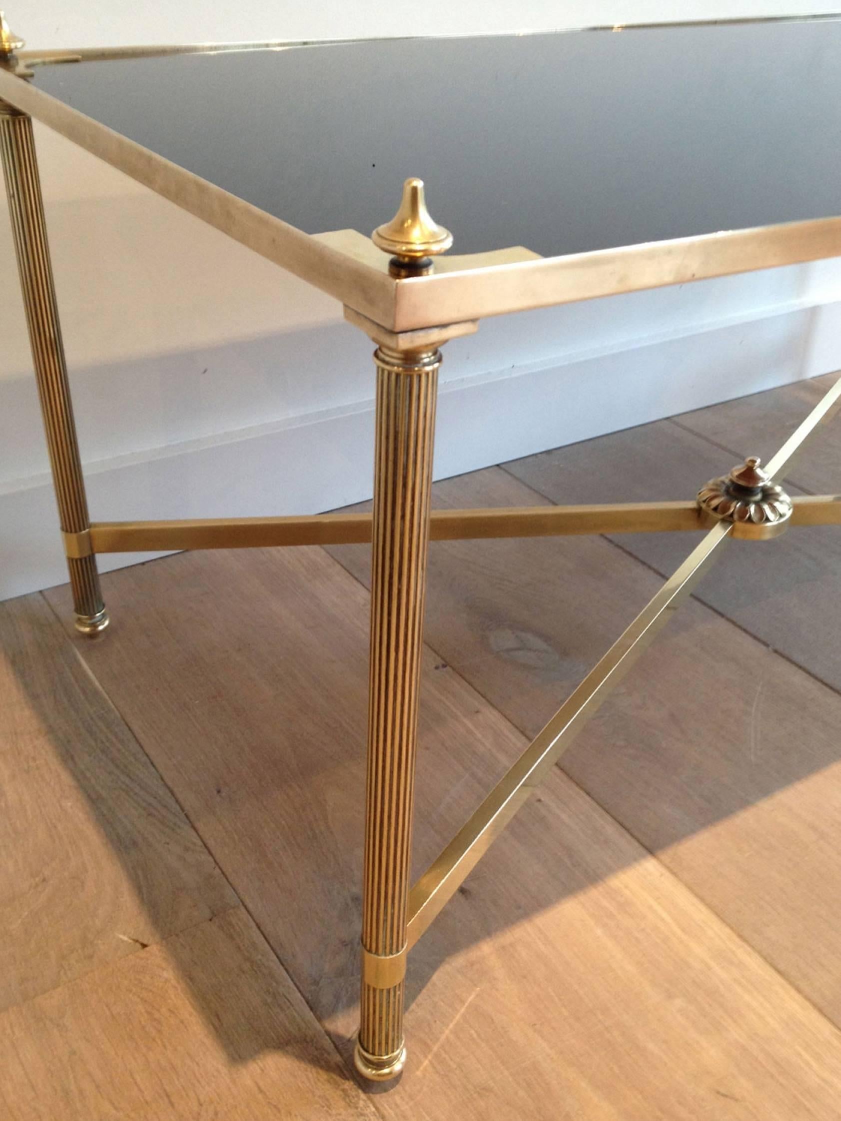 Neoclassical 1940s Jansen Brass and Black Lacquered Glass Coffee Table For Sale
